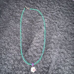 Green Beaded Necklace with Flower Pendant